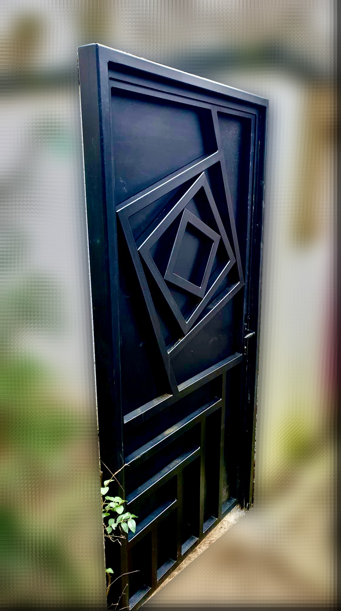 Stone high fence with shut iron door
